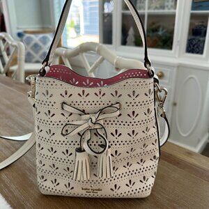 Kate Spade Cream Laser-Cut Bucket Bag with Tassel Drawstring